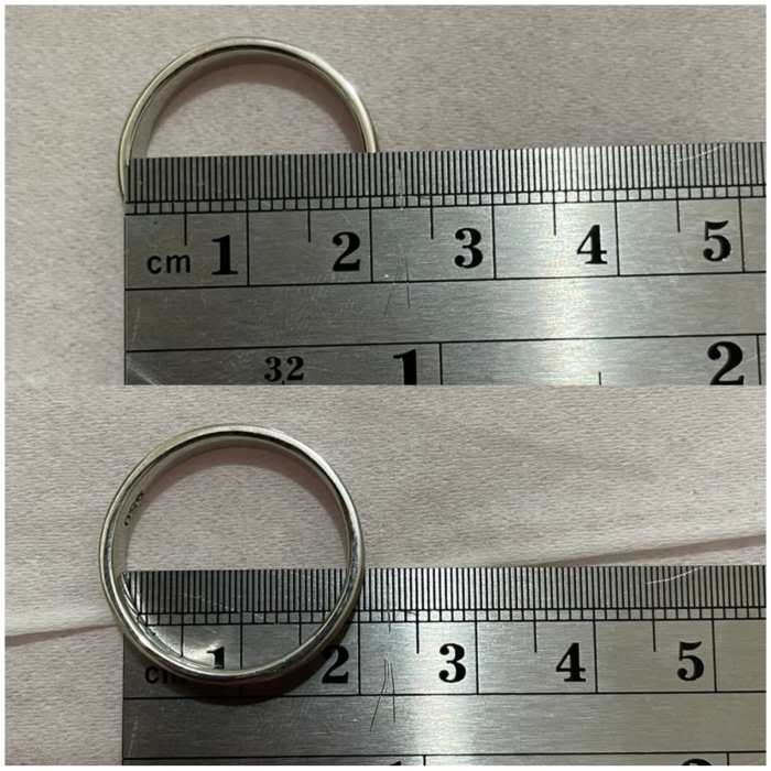 Cincin ukuran jari mengukur menentukan pulpen kemudian ditandai kertas